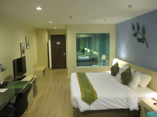 Imagen de la habitación del Hotel Tamarind Garden. Foto 11
