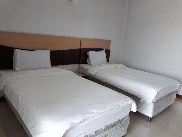 Imagen de la habitación del Hotel Tamarind Place. Foto 4