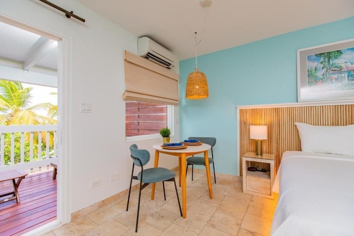 Imagen de la habitación del Hotel Tamarind Reef Resort Spa and Marina. Foto 8