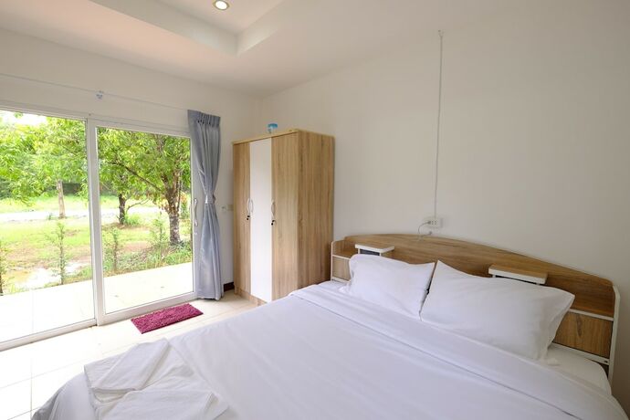 Imagen de la habitación del Hotel Tamarind Resort. Foto 20