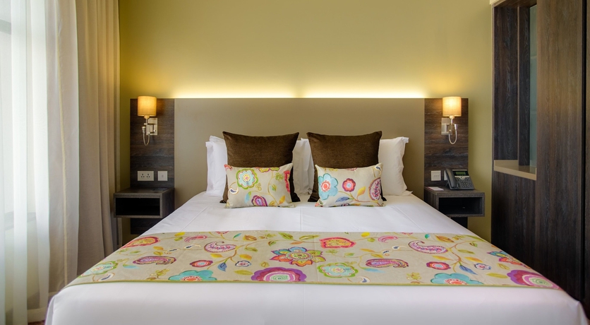 Imagen de la habitación del Hotel Tamarind Tree. Foto 7