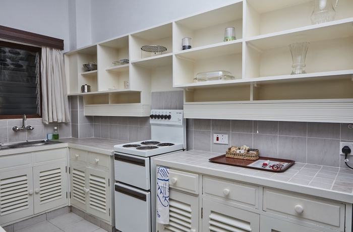 Imagen de la habitación del Hotel Tamarind Village Apartments. Foto 11