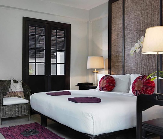 Imagen de la habitación del Hotel Tamarind Village. Foto 14