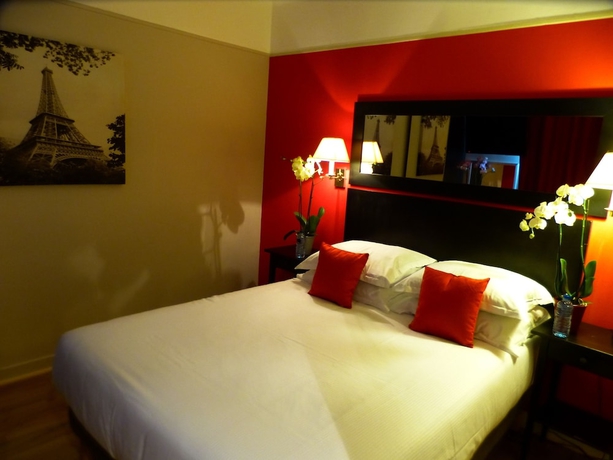 Imagen de la habitación del Hotel Tamaris, París. Foto 6