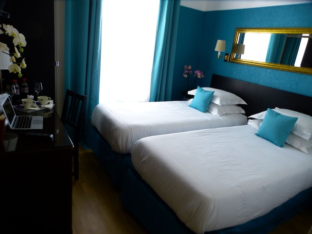 Imagen de la habitación del Hotel Tamaris, París. Foto 8