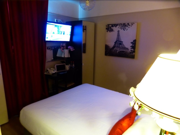 Imagen de la habitación del Hotel Tamaris, París. Foto 11