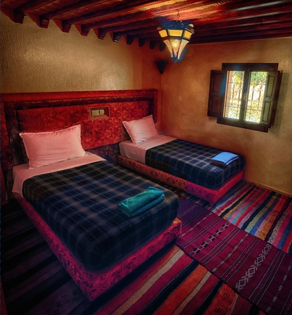 Imagen de la habitación del Hotel Tamatert Guest House. Foto 7