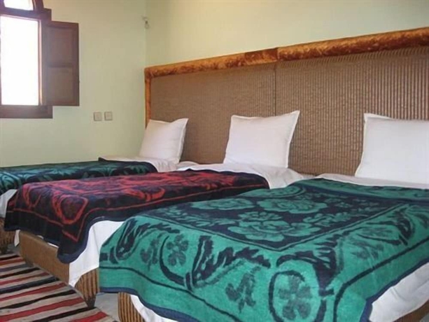 Imagen de la habitación del Hotel Tamatert Guest House. Foto 15