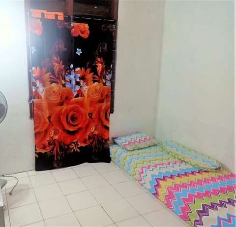 Imagen de la habitación del Hotel Tambak Bayan Guesthouse. Foto 10