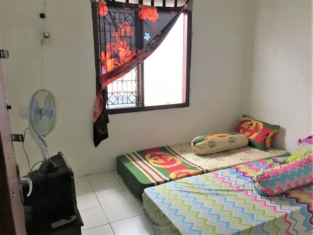 Imagen de la habitación del Hotel Tambak Bayan Guesthouse. Foto 11