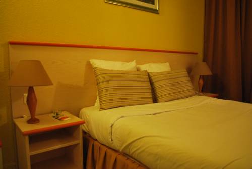 Imagen de la habitación del Hotel Tambourin. Foto 8