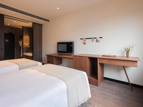 Imagen general del Hotel Tan Alley Wuzhen Eco and Cultural Community. Foto 3