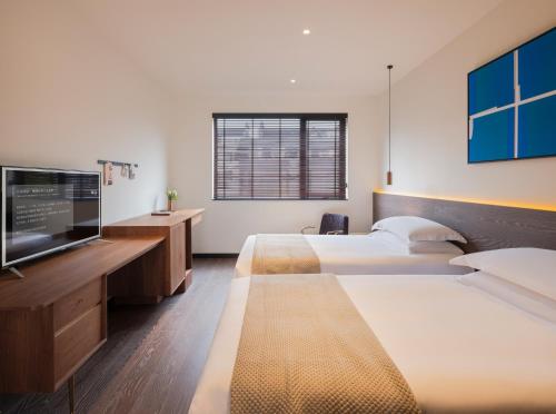Imagen general del Hotel Tan Alley Wuzhen Eco and Cultural Community. Foto 4