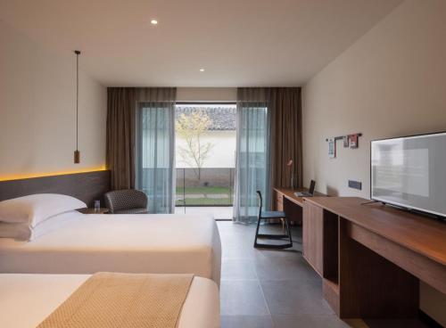 Imagen general del Hotel Tan Alley Wuzhen Eco and Cultural Community. Foto 7