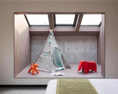 Imagen de la habitación del Hotel Tan Alley Wuzhen Eco and Cultural Community. Foto 17