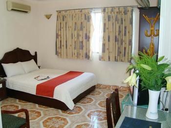 Imagen de la habitación del Hotel Tan Hoang Long District 5. Foto 11