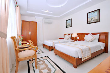 Imagen de la habitación del Hotel Tan Hoang Long District 5. Foto 13