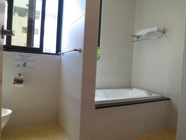 Imagen de la habitación del Hotel Tan Hui. Foto 9