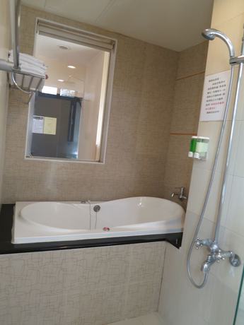 Imagen de la habitación del Hotel Tan Hui. Foto 11