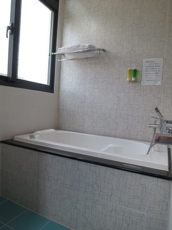Imagen de la habitación del Hotel Tan Hui. Foto 12