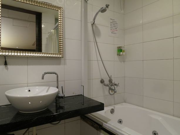 Imagen de la habitación del Hotel Tan Hui. Foto 15