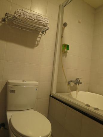 Imagen de la habitación del Hotel Tan Hui. Foto 19