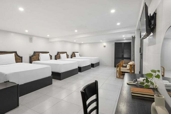 Imagen de la habitación del Hotel Tan Villa 2. Foto 15