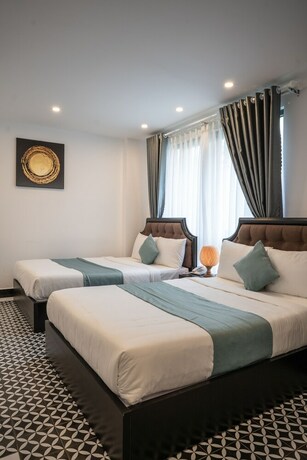 Imagen de la habitación del Hotel Tan Villa 2. Foto 21