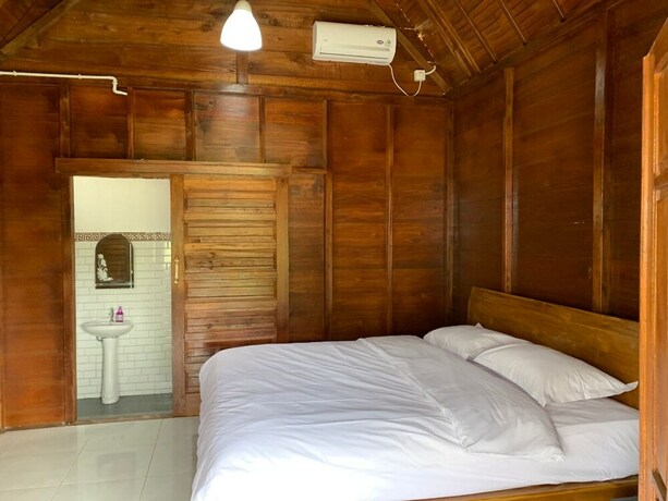 Imagen de la habitación del Hotel Tanah Penida Bungalow. Foto 21