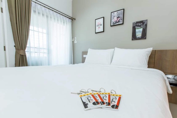 Imagen de la habitación del Hotel Tanban Mansion Surin. Foto 8