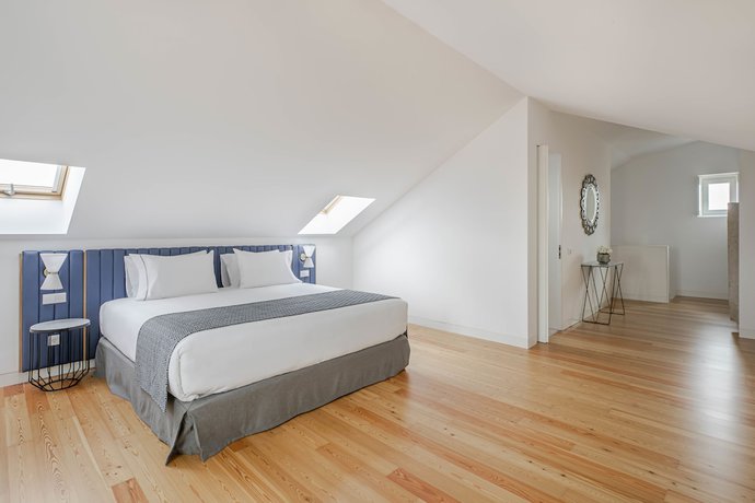 Imagen de la habitación del Hotel Tandem Palacio Alfama Suites. Foto 11