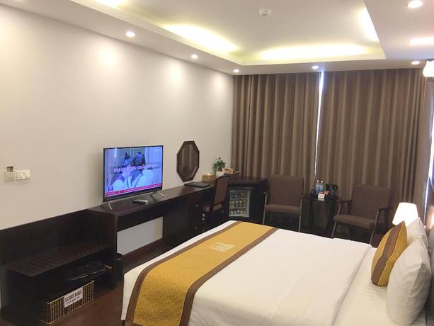 Imagen de la habitación del Hotel Tandm Luxury Hanoi. Foto 7