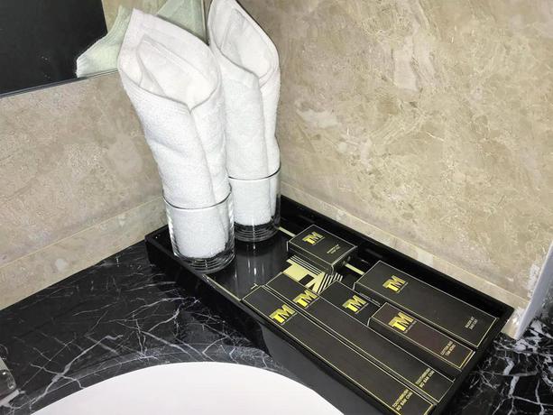 Imagen de la habitación del Hotel Tandm Luxury Hanoi. Foto 8