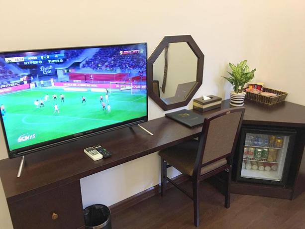 Imagen de la habitación del Hotel Tandm Luxury Hanoi. Foto 10