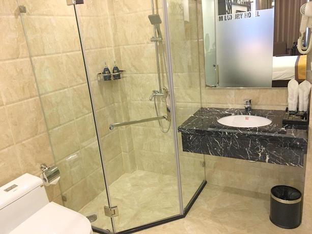 Imagen de la habitación del Hotel Tandm Luxury Hanoi. Foto 16