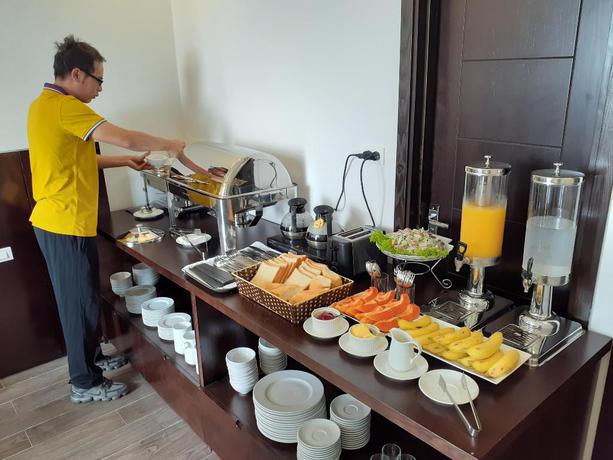 Imagen del bar/restaurante del Hotel Tandm Luxury Hanoi. Foto 4