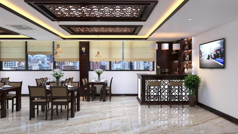 Imagen del bar/restaurante del Hotel Tandm Luxury Hanoi. Foto 6