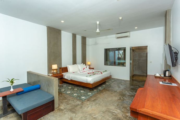 Imagen de la habitación del Hotel Tanei Angkor Resort and Spa. Foto 16