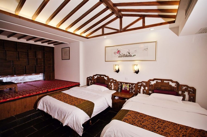 Imagen de la habitación del Hotel Tang Dynasty Art Garden. Foto 6