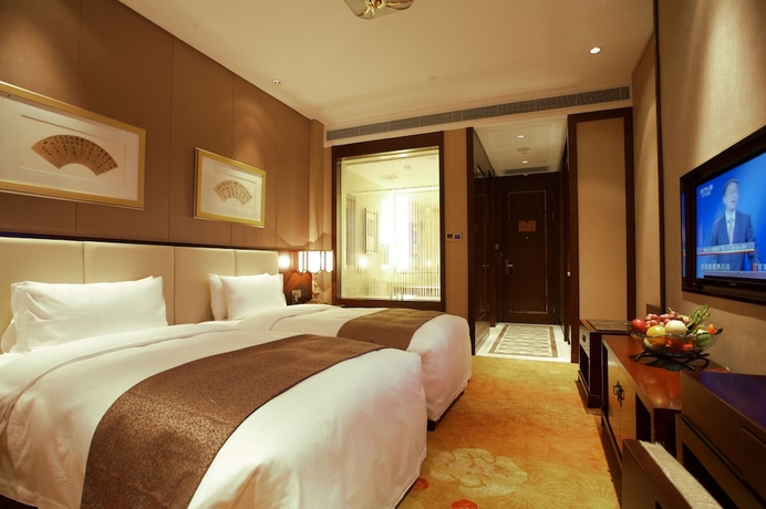 Imagen de la habitación del Hotel Tang Dynasty West Market Hotel Xi'an. Foto 3