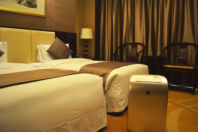 Imagen de la habitación del Hotel Tang Dynasty West Market Hotel Xi'an. Foto 13