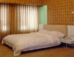 Imagen de la habitación del Hotel Tang Yue. Foto 1