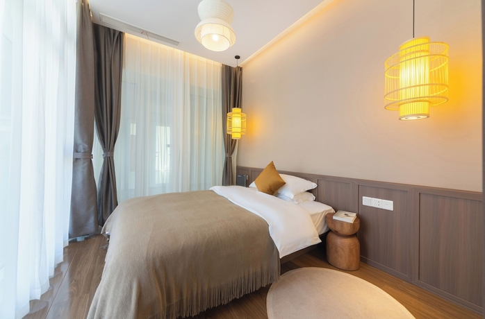Imagen de la habitación del Hotel Tangchi Seaview Resort. Foto 2