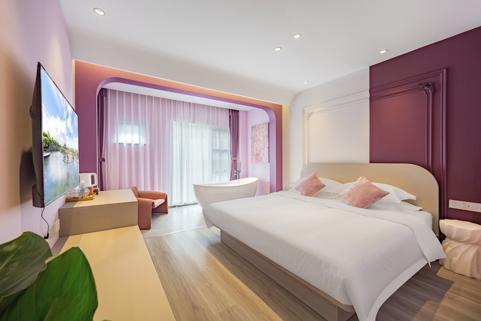 Imagen de la habitación del Hotel Tangchi Seaview Resort. Foto 4