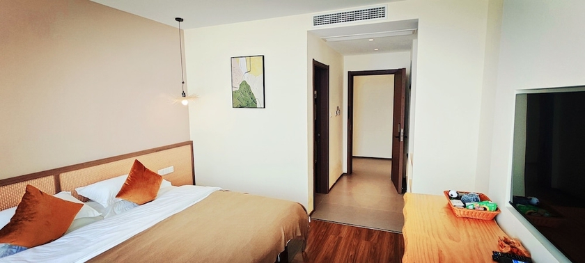 Imagen de la habitación del Hotel Tangchi Seaview Resort. Foto 8