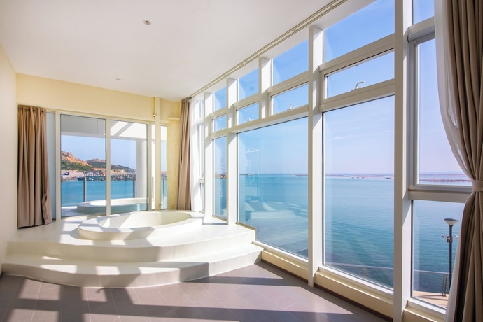 Imagen de la habitación del Hotel Tangchi Seaview Resort. Foto 10