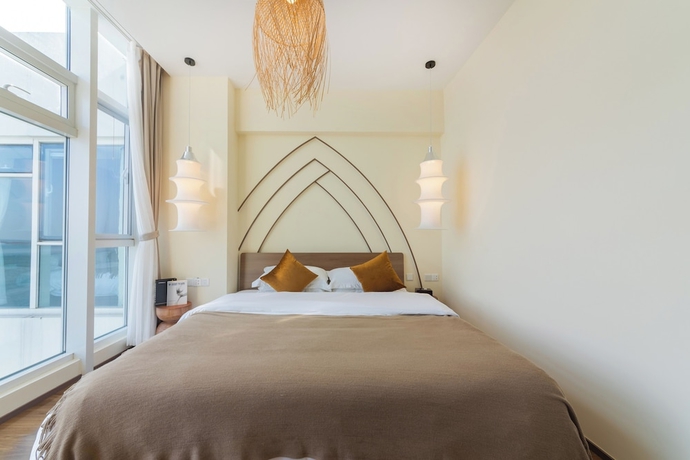 Imagen de la habitación del Hotel Tangchi Seaview Resort. Foto 12
