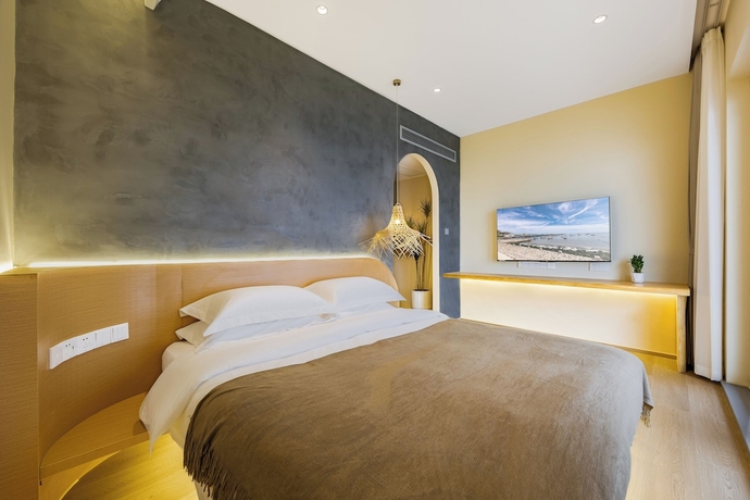 Imagen de la habitación del Hotel Tangchi Seaview Resort. Foto 15