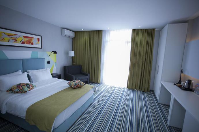 Imagen de la habitación del Hotel Tangerine Apart Batumi. Foto 4