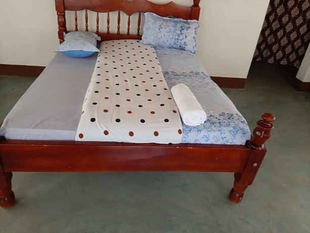 Imagen de la habitación del Hotel Tangi Safaris Lodge. Foto 17